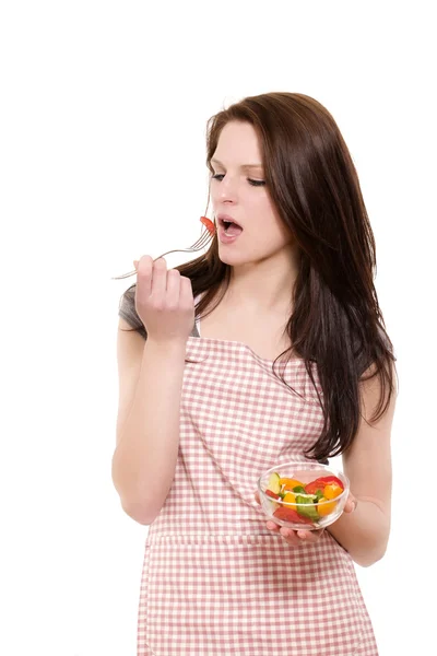 Młoda kobieta je sałatkę — Zdjęcie stockowe