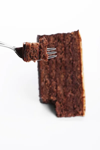 Pièce d'un gâteau au chocolat sur une fourchette — Photo