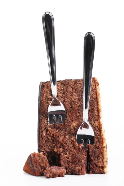 Due forchette che si attaccano in una torta al cioccolato — Foto Stock