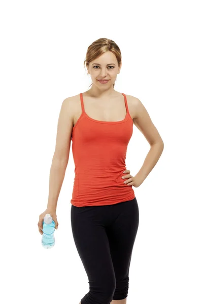 Фитнес-женщина с бутылкой воды — стоковое фото