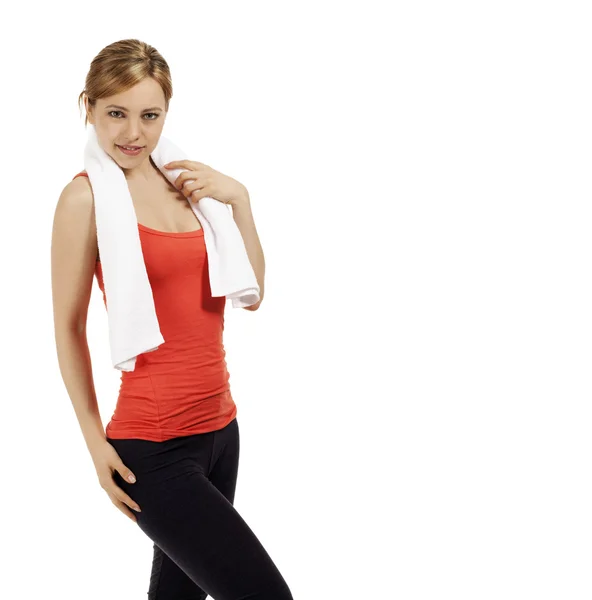 Sporty woman with a white towel — Stock Photo, Image
