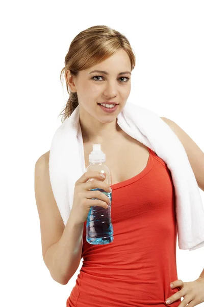 Jovem mulher esportiva com uma garrafa de água — Fotografia de Stock