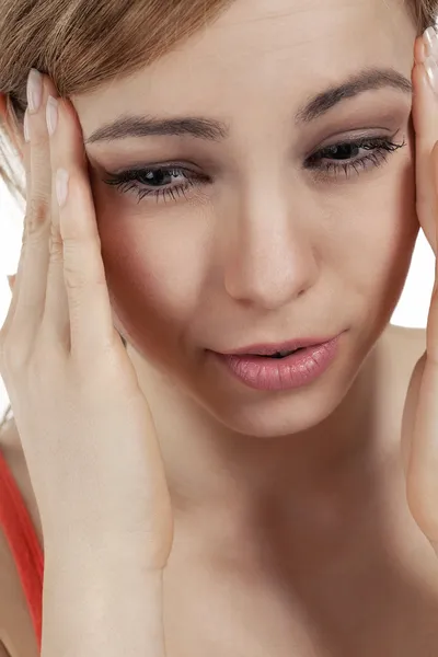 Mulher jovem com dor de cabeça — Fotografia de Stock