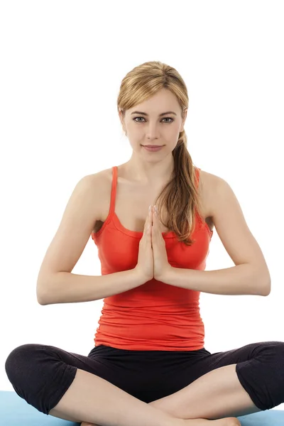 Young woman exercising yoga — Stock Photo, Image