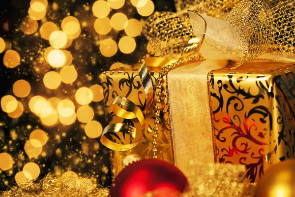 Golden christmas gift — Stock Photo, Image