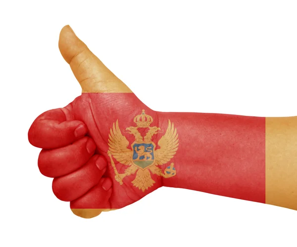 Montenegro bandiera sul pollice in su gesto come icona — Foto Stock