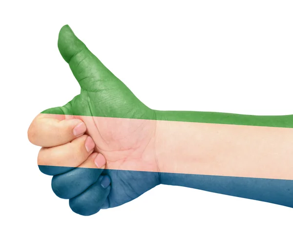 Прапор Сьєрра-Леоне на великий палець вгору жестом як значок — стокове фото