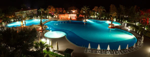 Panorama of pool at night — Stock Photo, Image