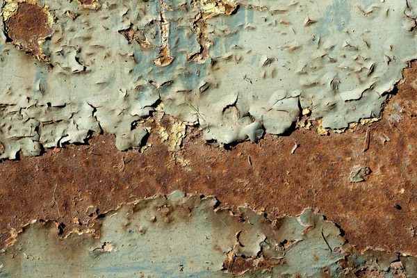 Plaat van metaal roestig op alle ondergronden, met oude lagen van een pai — Stockfoto