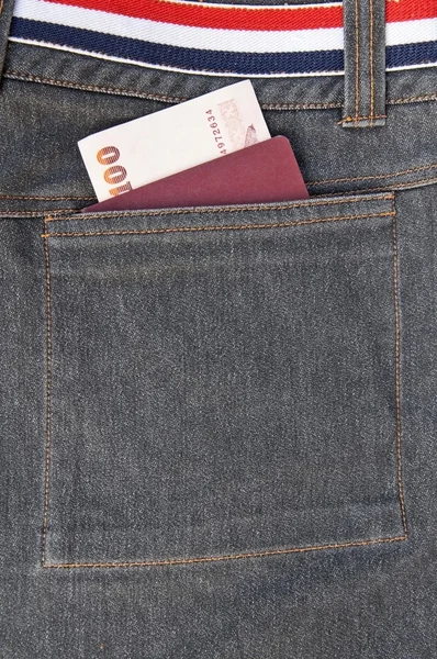 Passport and blank note put in blue Jean pocket — Stock Photo, Image