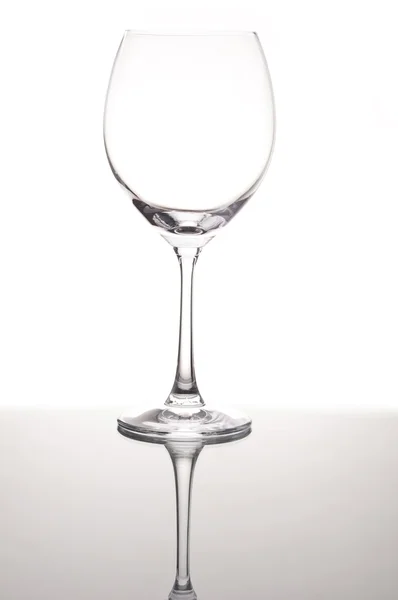 Empty wine glass with mirror reflection — Stock Photo, Image