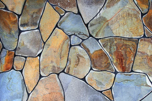 Fragmento de una pared de una piedra astillada — Foto de Stock