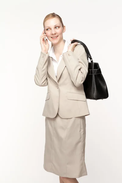 Mulher de negócios bonita sorrindo no fundo branco — Fotografia de Stock