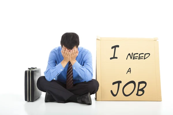 Depressed businessman looking for a job — Stock Photo, Image