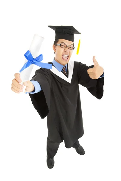 Estudante de graduação animado com polegares para cima — Fotografia de Stock