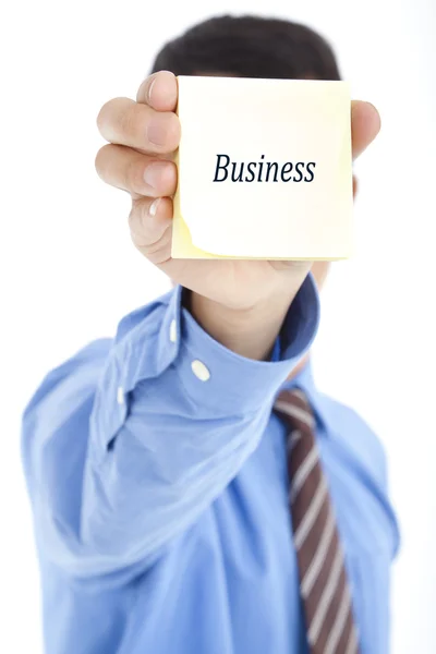 Business man holding post with text BUSINESS — Stock Photo, Image