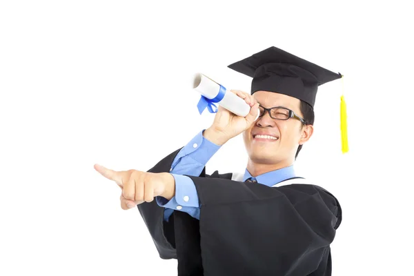 Examen student tittar och pekar — Stockfoto