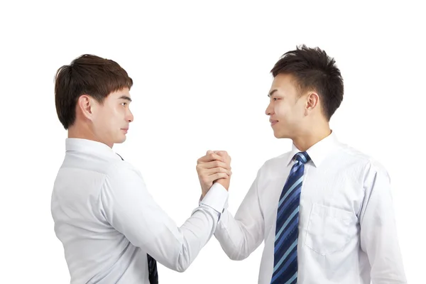 Два бизнесмена держатся за руки для сотрудничества — стоковое фото
