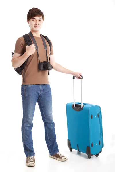Lunghezza intera del giovane viaggiatore con valigia — Foto Stock