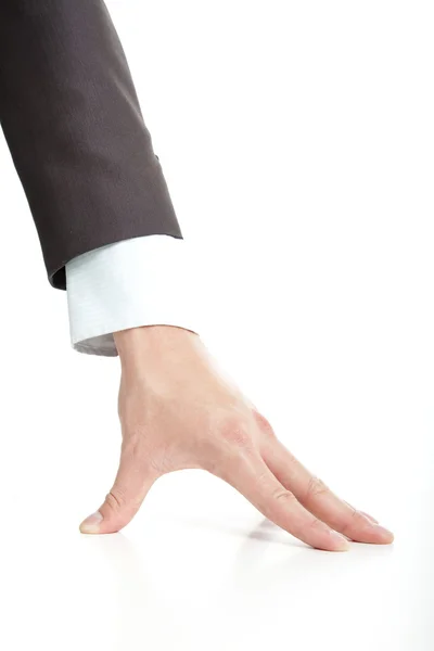 Close up van zakenman hand zetten op de verdieping — Stockfoto