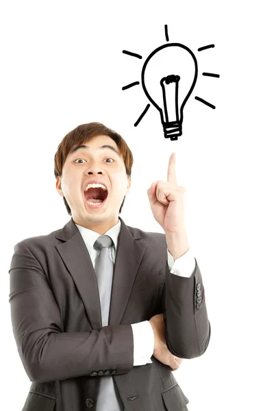 アイディアを得た。電球とアイデアのコンセプトを持ったビジネスマン — ストック写真