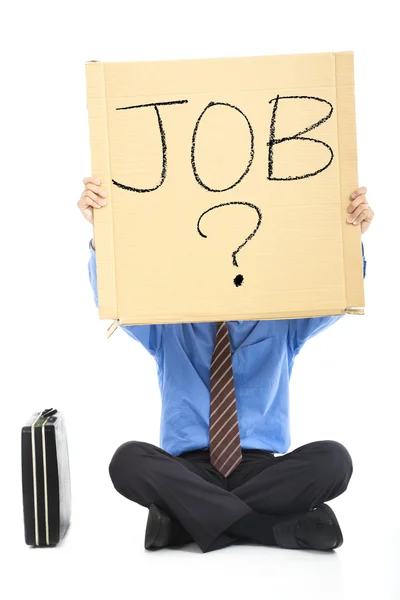 Empresário segurando o texto à procura de um emprego — Fotografia de Stock