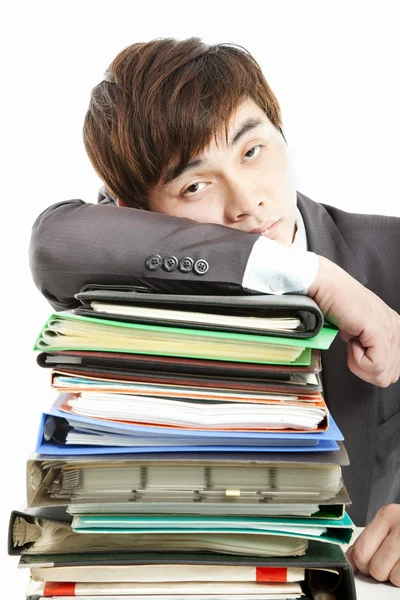 Empresário cansado com papelada — Fotografia de Stock