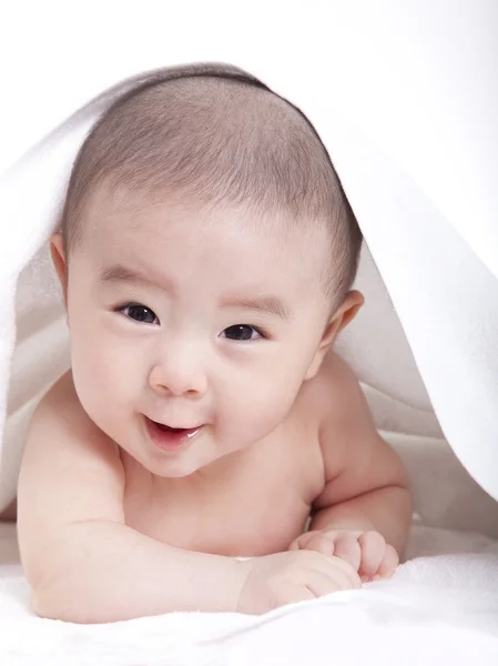 Adorable baby lying on the bed — Stock Photo, Image