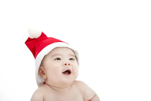 Sweet baby in christmas hat — Stock Photo, Image