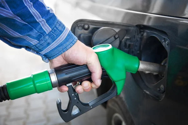 stock image Hand Refilling the black Car with Fuel