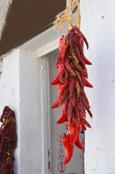 Red Chili Peppers hanging outdoor. — Stock Photo, Image