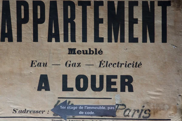 Old real estate sign in Paris — Stock Photo, Image