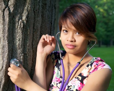 Tree Hugger with Stethoscope