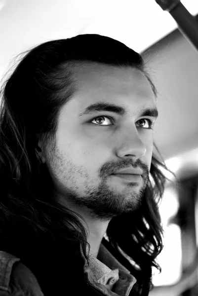 Young sexy guy with long hair black-white — Stock Photo, Image