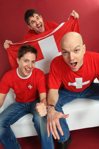 Cheering Swiss sports fans — Stock Photo, Image