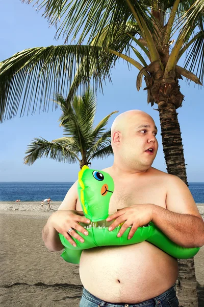 Fat man on the beach — Stock Photo, Image
