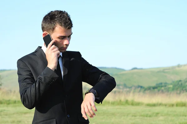 Hombre de negocios con teléfono —  Fotos de Stock