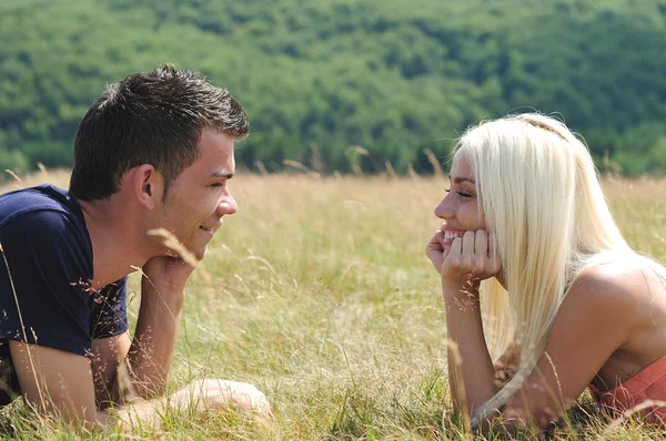 Young couple in nature — Stock Photo, Image