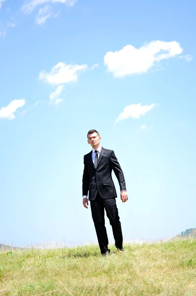 Biznes człowiek stojący — Zdjęcie stockowe