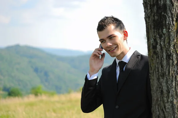 Hombre de negocios con teléfono —  Fotos de Stock