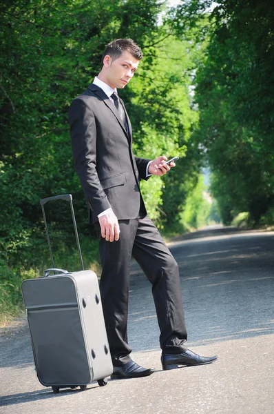 Business man on road — Stock Photo, Image