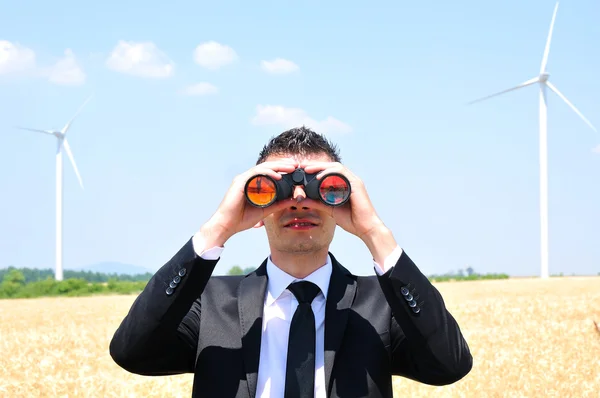 Business man with binocular — Stock Photo, Image