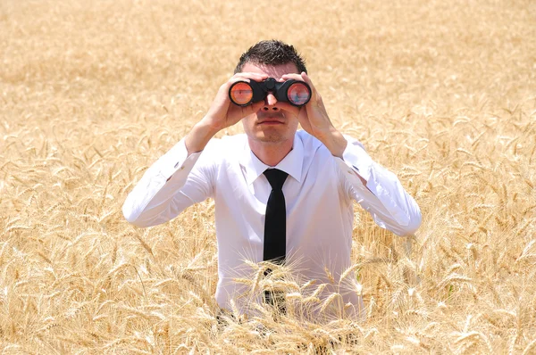 Business Man with binocular — Stock Photo, Image