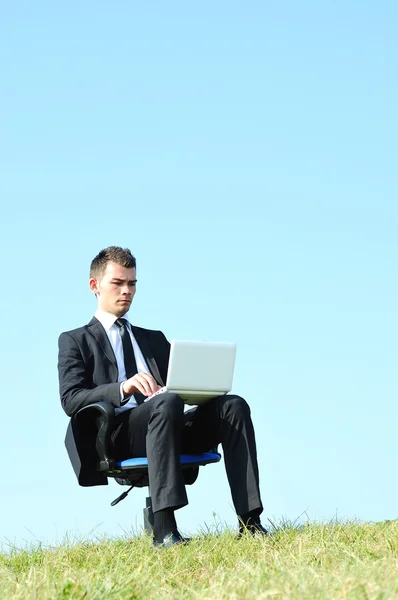 Business man with laptop Royalty Free Stock Photos
