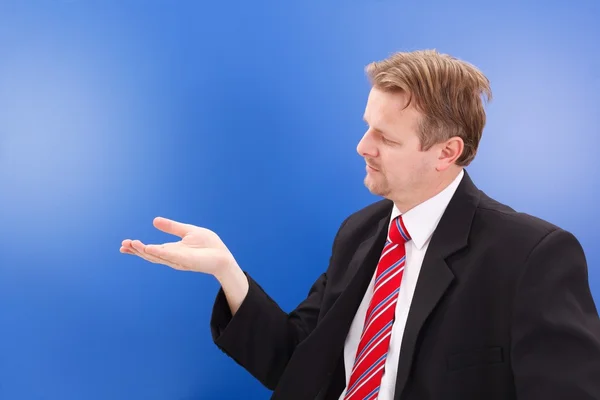 Business man holding imaginary object — Stock Photo, Image