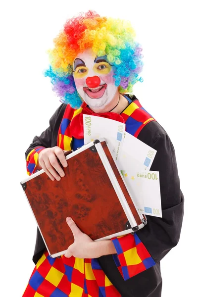 Clown holding briefcase with money — Stock Photo, Image