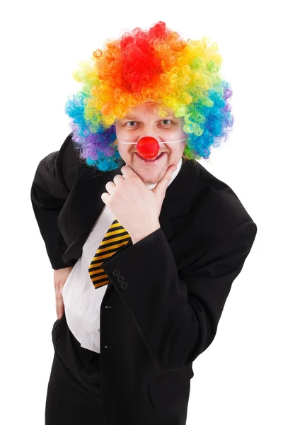 Homme d'affaires portant une perruque clown colorée — Photo