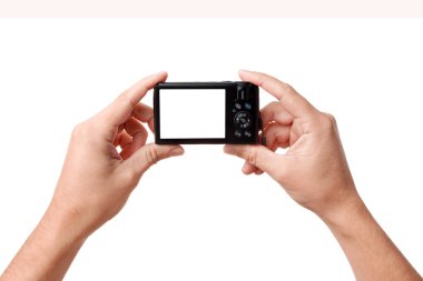 Hands holding digital photo camera clipart