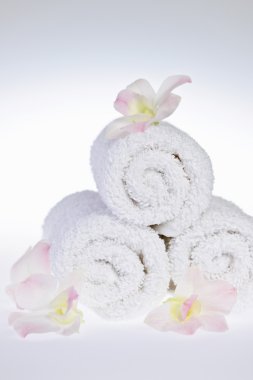 White rolled up spa towels clipart