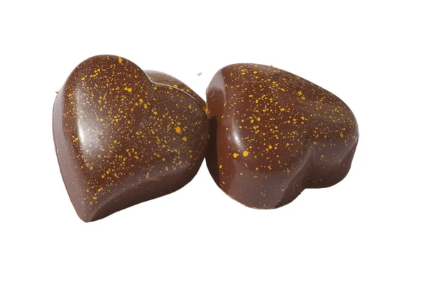 Eart-shaped milk chocolate candy, isolated on white — Stock Photo, Image